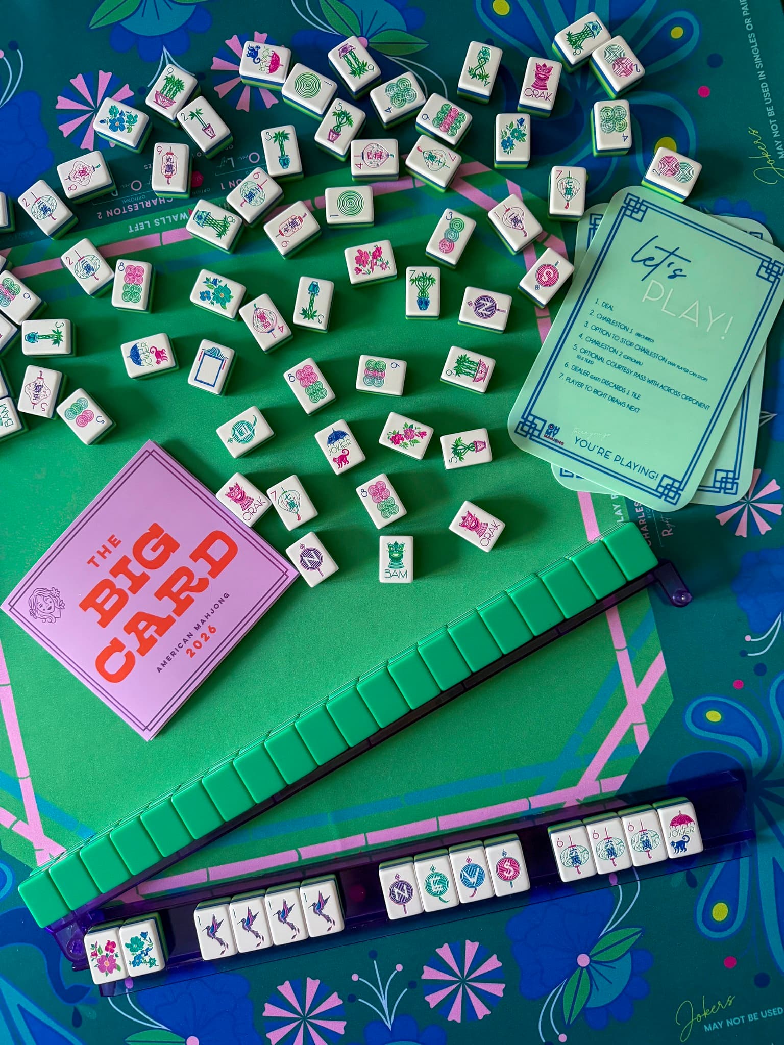 Mahj Haus tile board set up for play — the Big Card, tiles scattered, let's play card